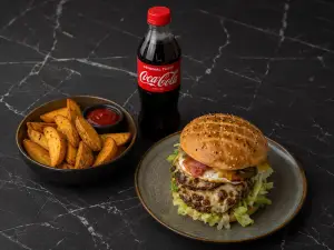 Don Burger + Potato Wedges + Cola 0.5 bei Don Roberto Graz